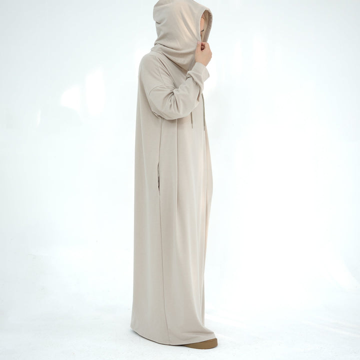 Get trendy with Alora Poly Hoodie Abaya - Sand -  available at Voilee NY. Grab yours for $49.90 today!