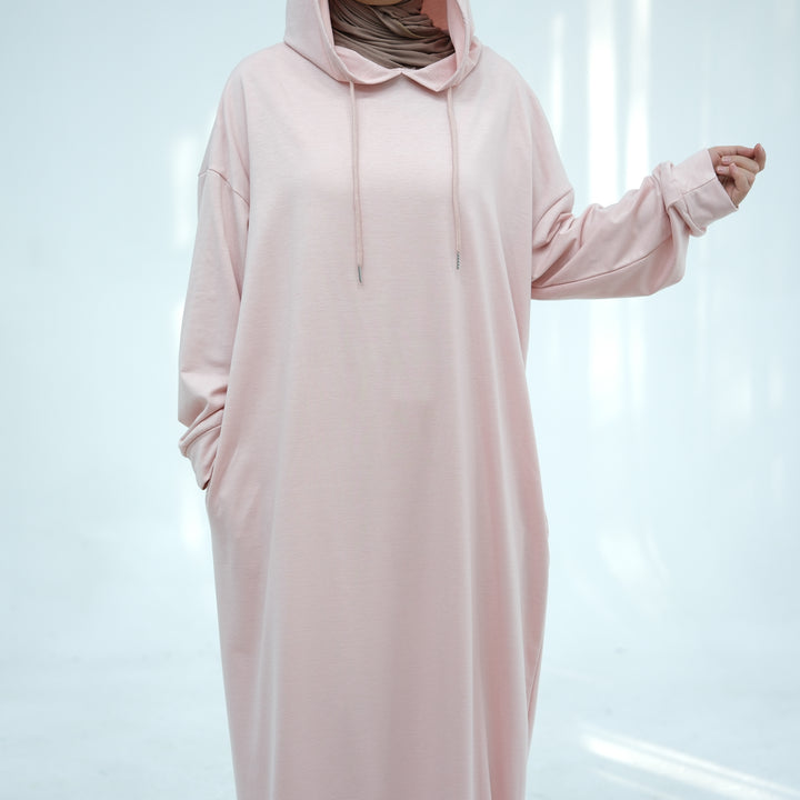 Get trendy with Alora Poly Hoodie Abaya - Pink -  available at Voilee NY. Grab yours for $49.90 today!