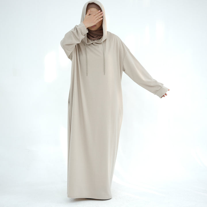 Get trendy with Alora Poly Hoodie Abaya - Sand -  available at Voilee NY. Grab yours for $49.90 today!