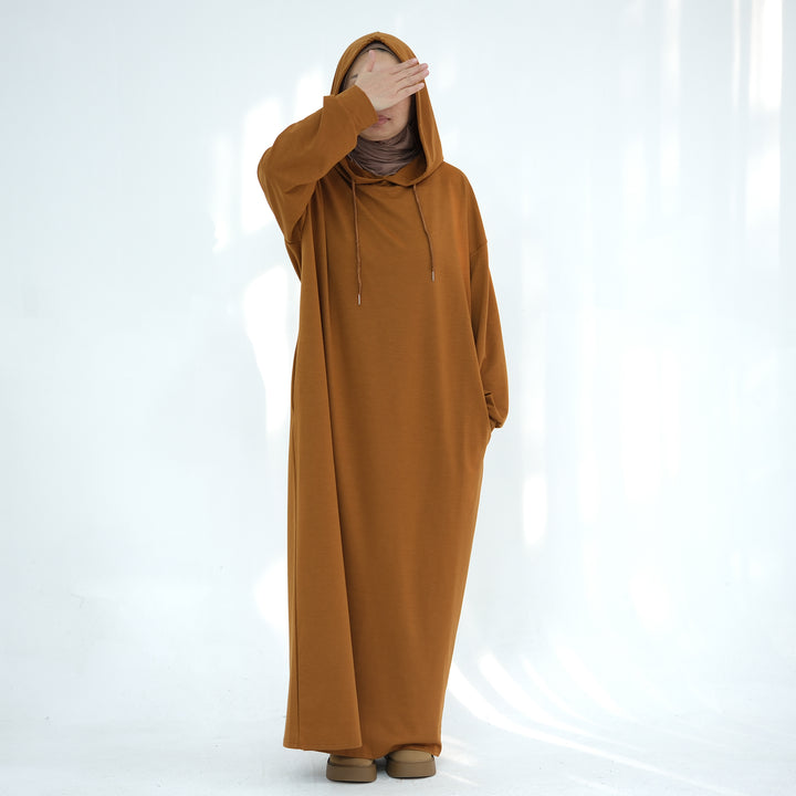 Get trendy with Alora Poly Hoodie Abaya - Ginger -  available at Voilee NY. Grab yours for $49.90 today!