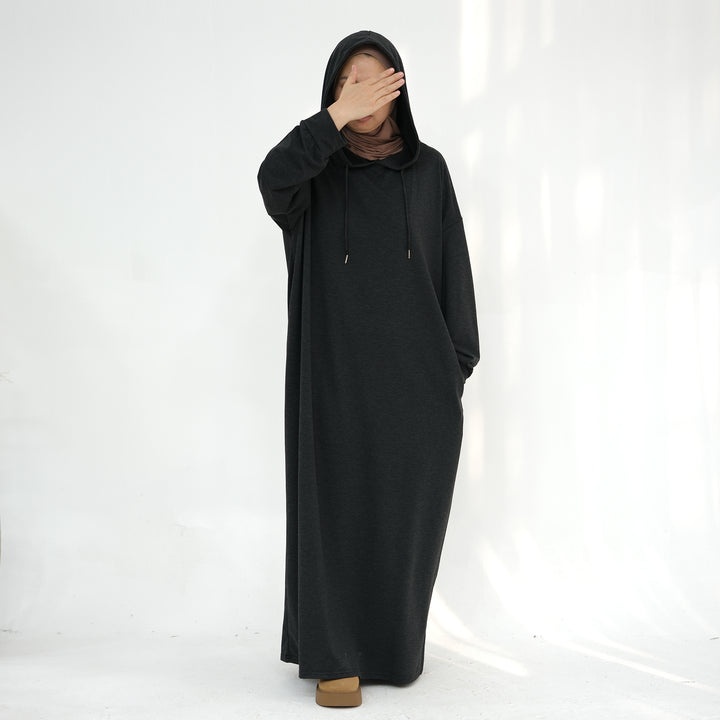 Get trendy with Alora Poly Hoodie Abaya - Charcoal Gray -  available at Voilee NY. Grab yours for $49.90 today!