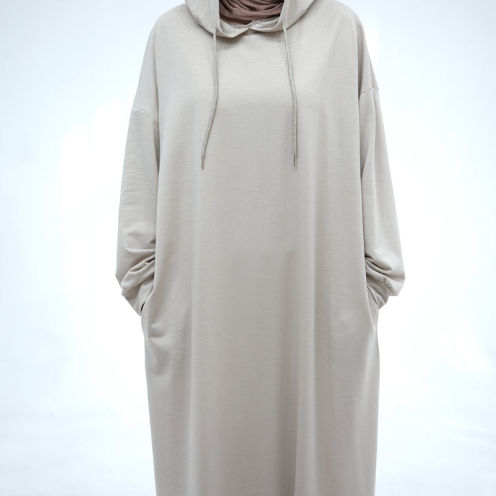 Get trendy with Alora Poly Hoodie Abaya - Sand -  available at Voilee NY. Grab yours for $49.90 today!