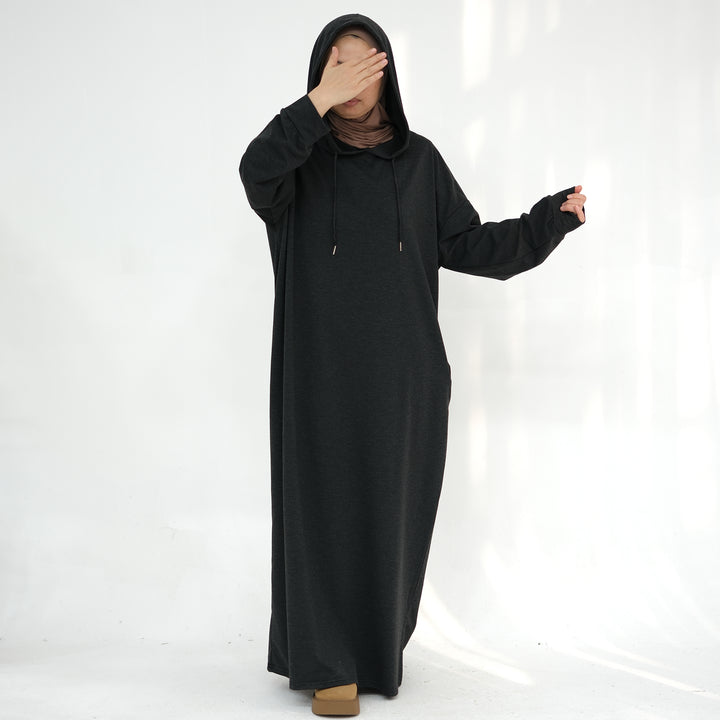 Get trendy with Alora Poly Hoodie Abaya - Charcoal Gray -  available at Voilee NY. Grab yours for $49.90 today!