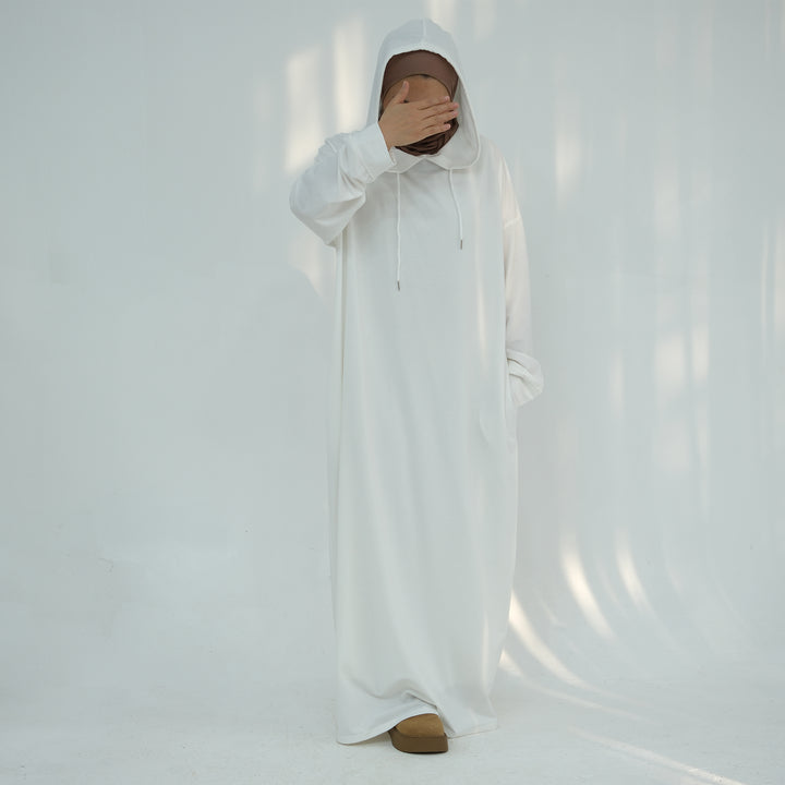 Get trendy with Alora Poly Hoodie Abaya - White -  available at Voilee NY. Grab yours for $49.90 today!