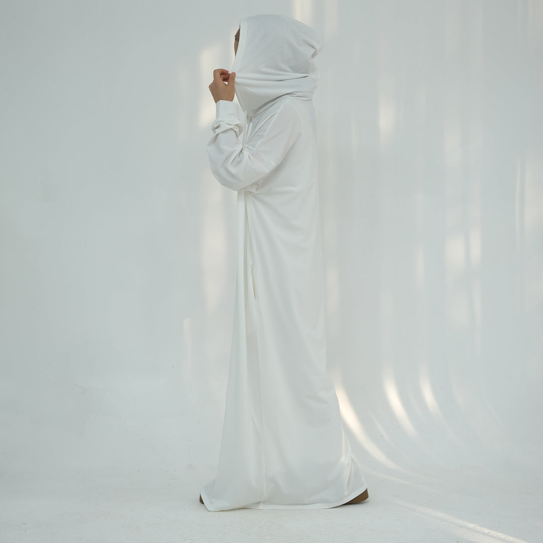 Get trendy with Alora Poly Hoodie Abaya - White -  available at Voilee NY. Grab yours for $49.90 today!