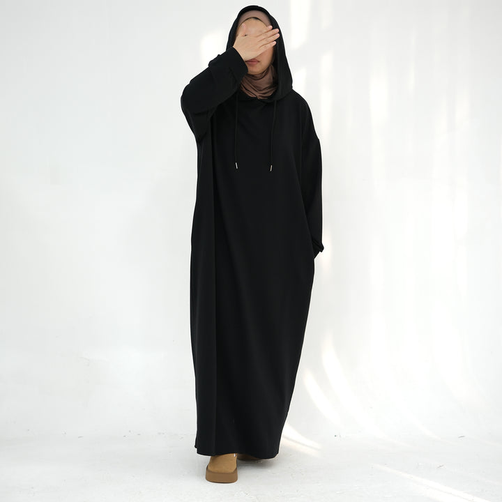 Get trendy with Alora Poly Hoodie Abaya - Black -  available at Voilee NY. Grab yours for $49.90 today!