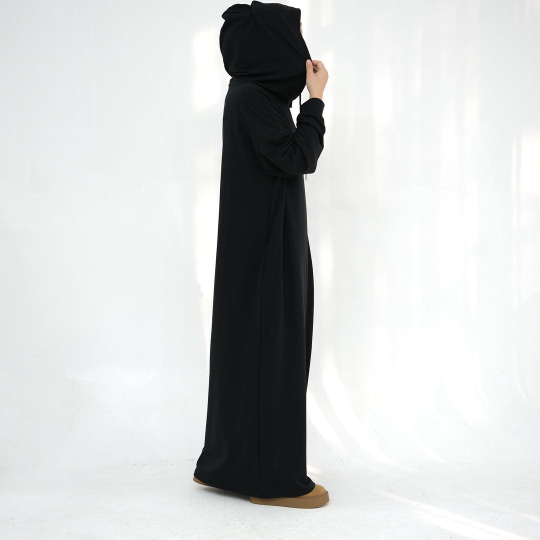 Get trendy with Alora Poly Hoodie Abaya - Black -  available at Voilee NY. Grab yours for $49.90 today!