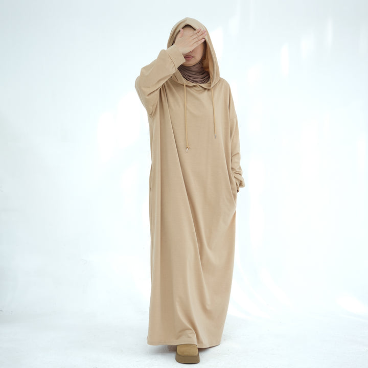 Get trendy with Alora Poly Hoodie Abaya - Tan -  available at Voilee NY. Grab yours for $49.90 today!