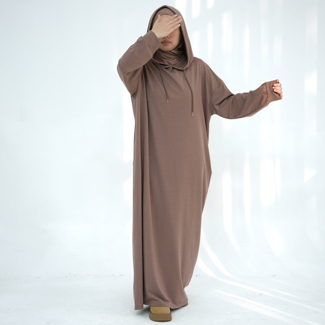 Get trendy with Alora Poly Hoodie Abaya - Taupe -  available at Voilee NY. Grab yours for $49.90 today!