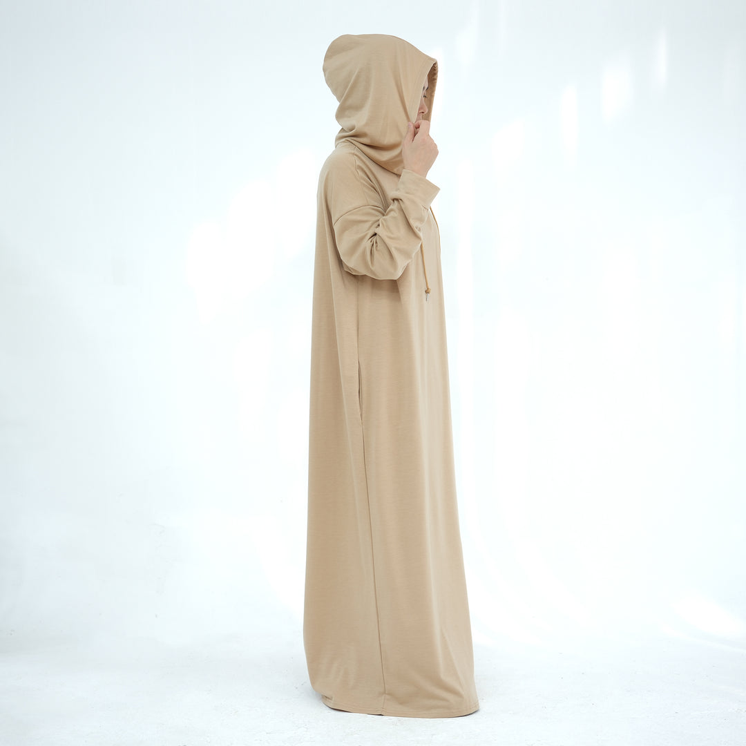 Get trendy with Alora Poly Hoodie Abaya - Tan -  available at Voilee NY. Grab yours for $49.90 today!