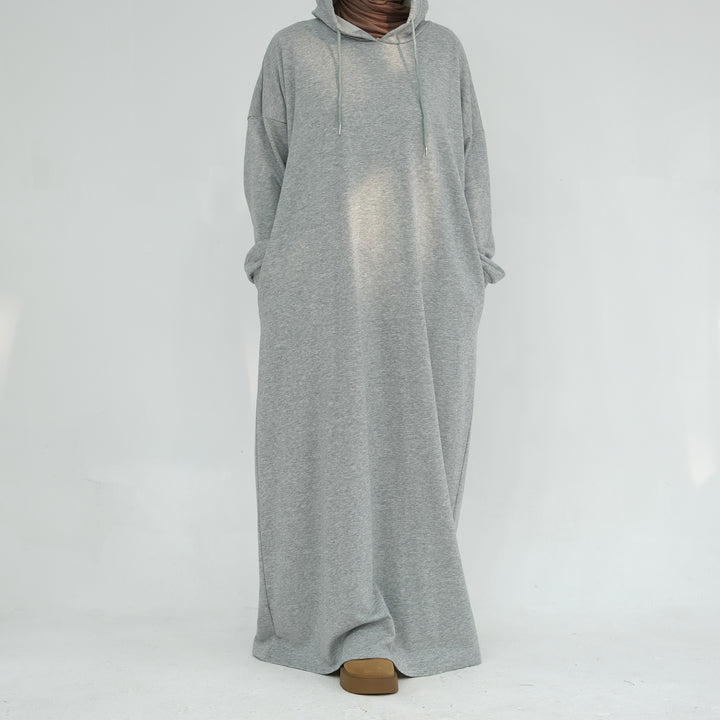 Get trendy with Alora Cotton Hoodie Abaya - Heather Gray -  available at Voilee NY. Grab yours for $59.90 today!