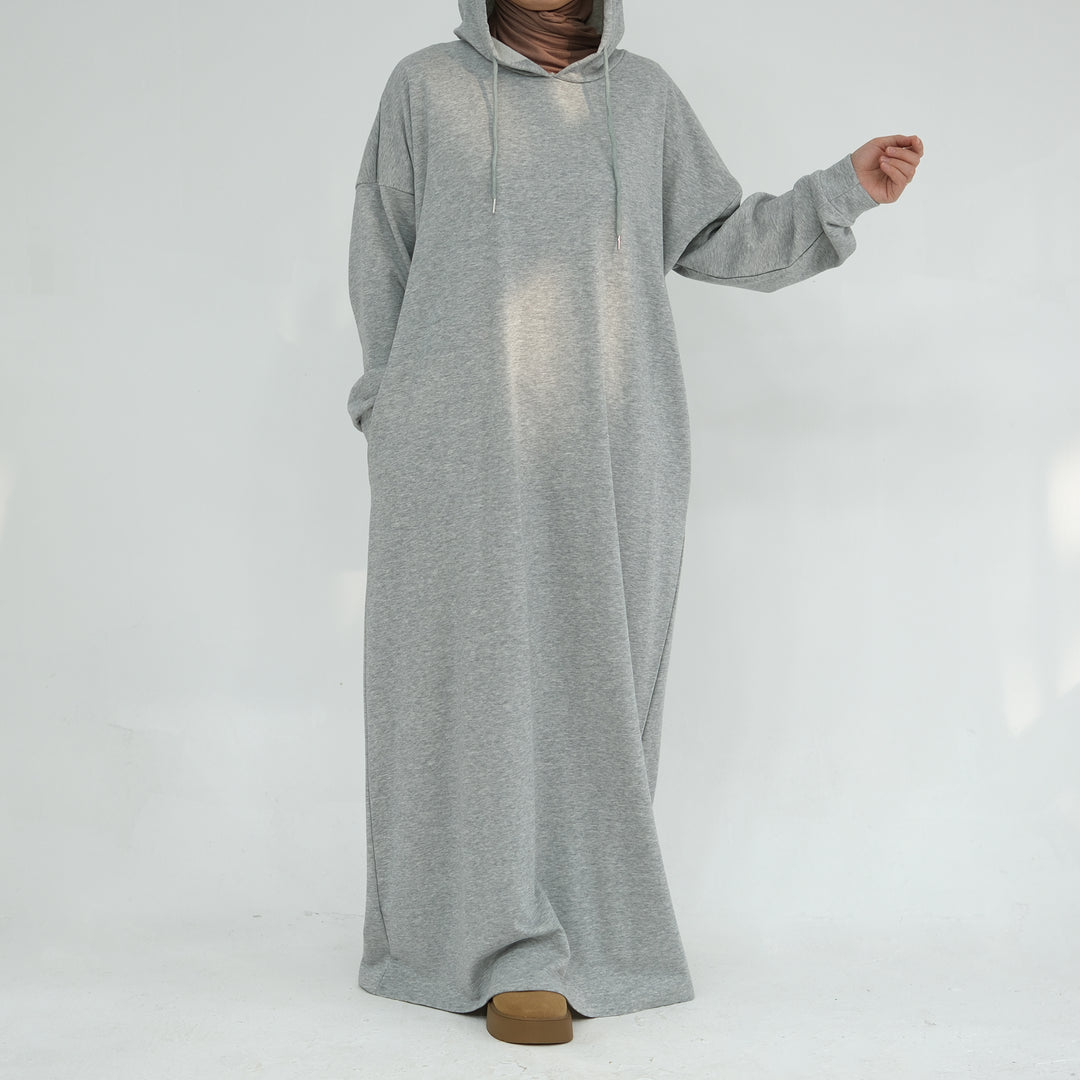 Get trendy with Alora Cotton Hoodie Abaya - Heather Gray -  available at Voilee NY. Grab yours for $59.90 today!