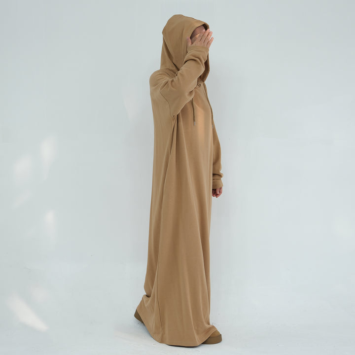 Get trendy with Alora Cotton Hoodie Abaya - Camel -  available at Voilee NY. Grab yours for $59.90 today!