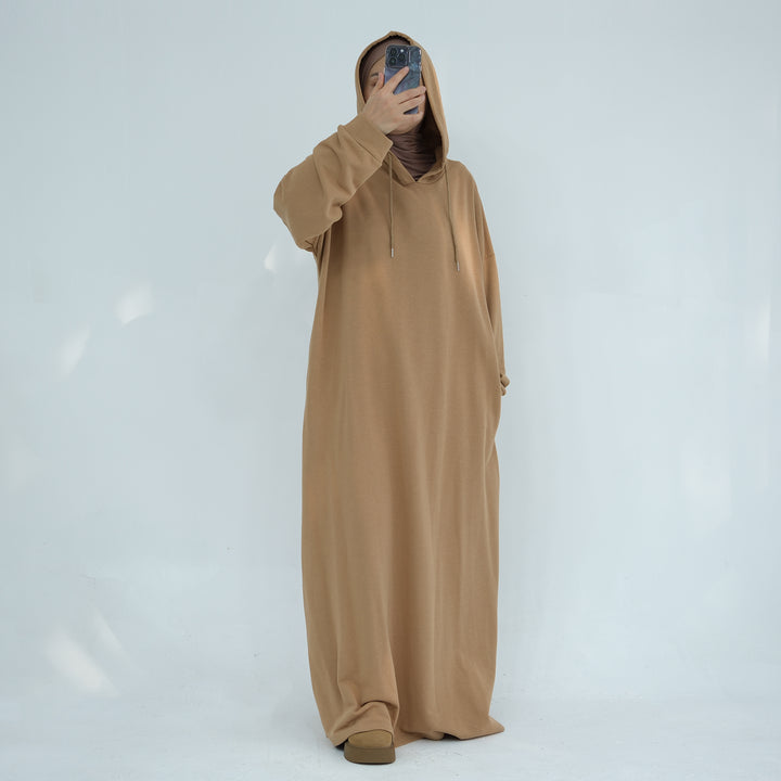 Get trendy with Alora Cotton Hoodie Abaya - Camel -  available at Voilee NY. Grab yours for $59.90 today!