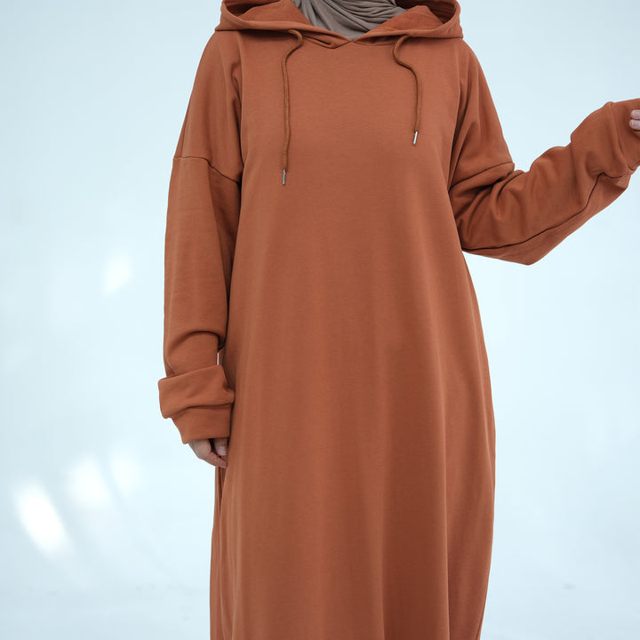 Get trendy with Alora Cotton Hoodie Abaya - Rust -  available at Voilee NY. Grab yours for $59.90 today!