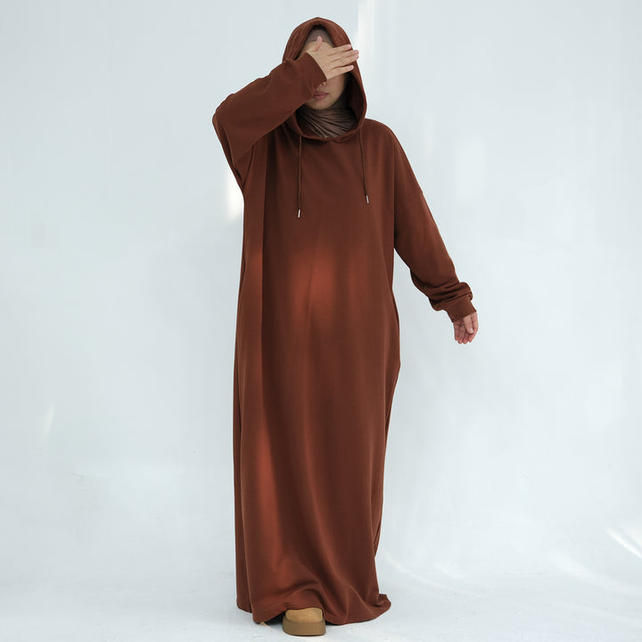 Get trendy with Alora Cotton Hoodie Abaya - Brown -  available at Voilee NY. Grab yours for $59.90 today!