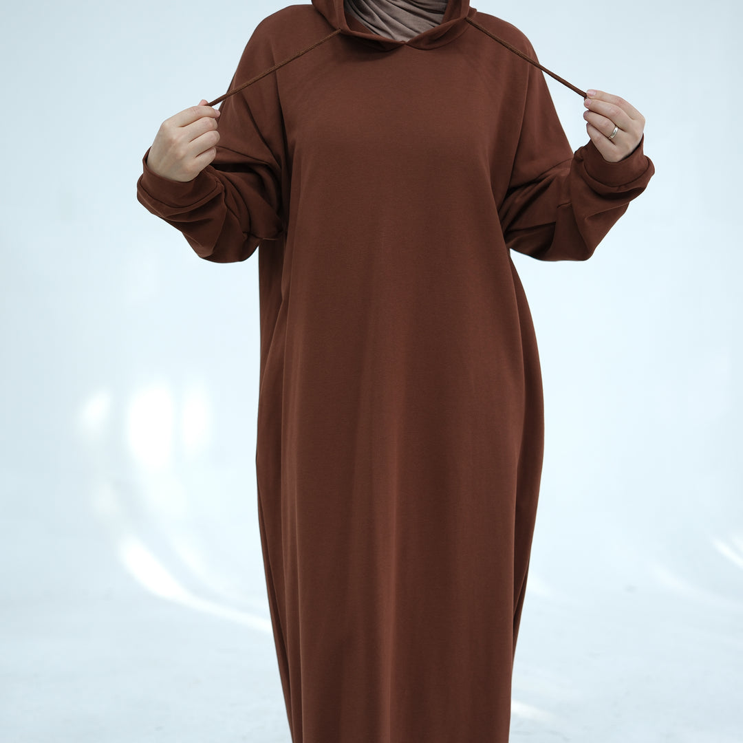 Get trendy with Alora Cotton Hoodie Abaya - Brown -  available at Voilee NY. Grab yours for $59.90 today!