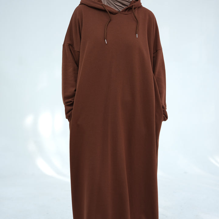 Get trendy with Alora Cotton Hoodie Abaya - Brown -  available at Voilee NY. Grab yours for $59.90 today!