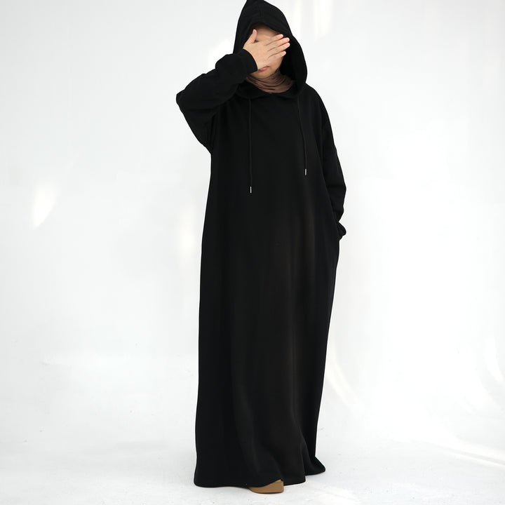 Get trendy with Alora Cotton Hoodie Abaya - Black -  available at Voilee NY. Grab yours for $59.90 today!