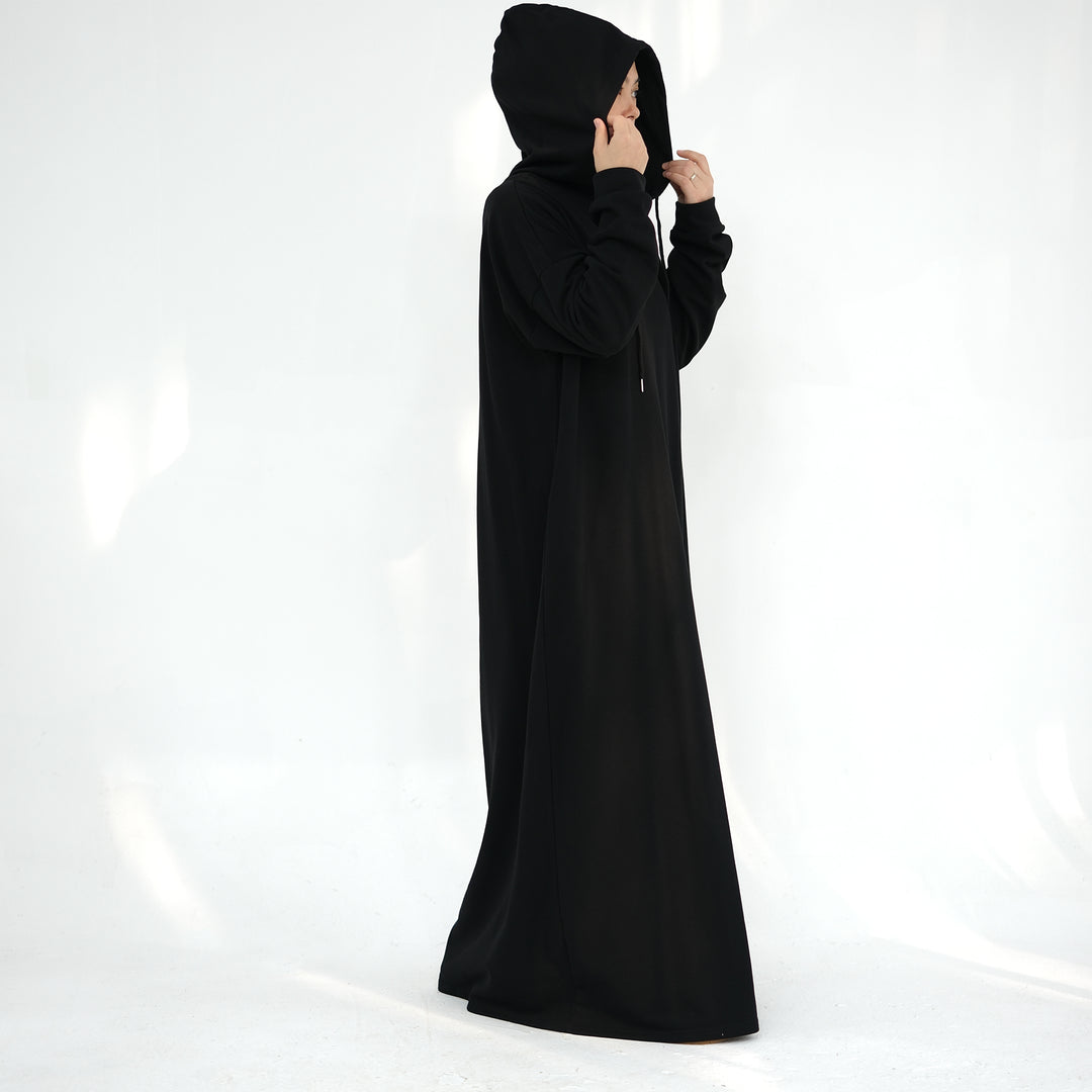 Get trendy with Alora Cotton Hoodie Abaya - Black -  available at Voilee NY. Grab yours for $59.90 today!