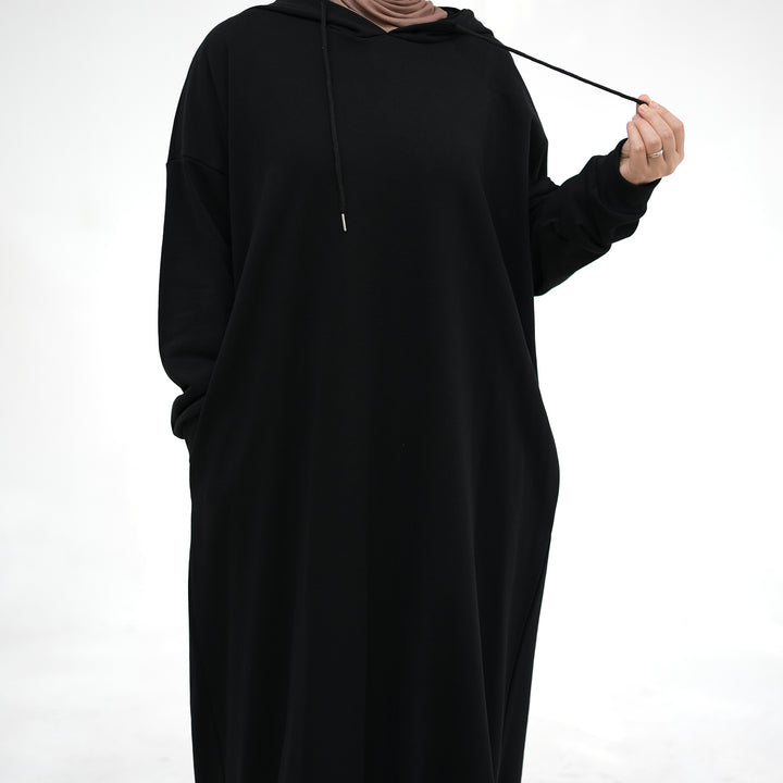 Get trendy with Alora Cotton Hoodie Abaya - Black -  available at Voilee NY. Grab yours for $59.90 today!