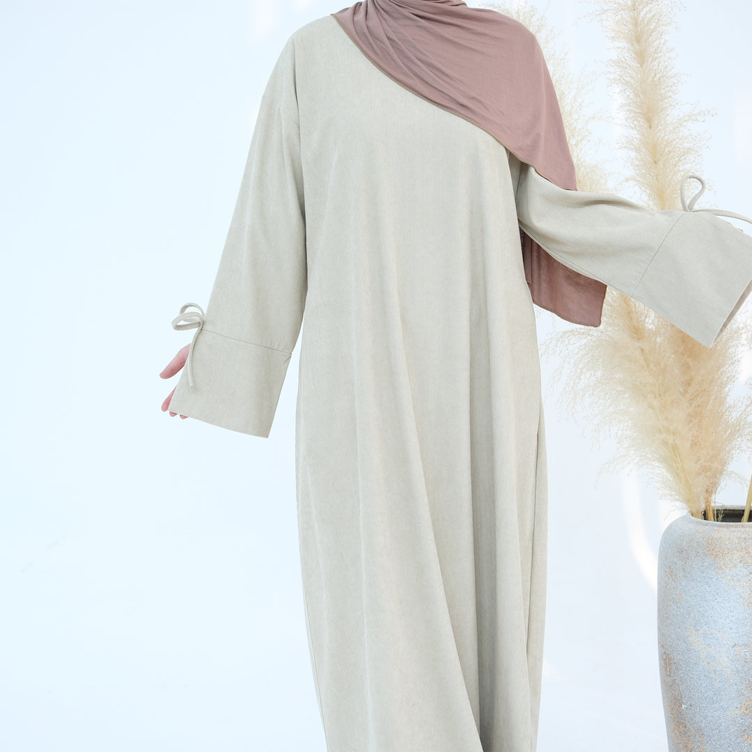 Get trendy with Tara Corduroy Abaya Dress - Beige - Dresses available at Voilee NY. Grab yours for $62.90 today!