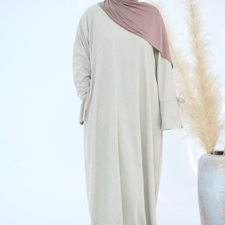 Get trendy with Tara Corduroy Abaya Dress - Beige - Dresses available at Voilee NY. Grab yours for $62.90 today!