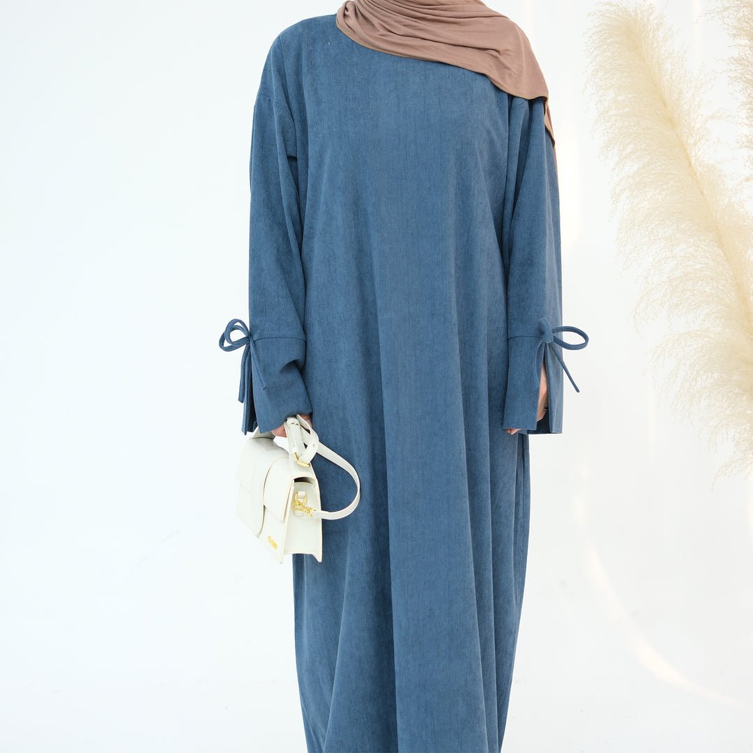 Get trendy with Tara Corduroy Abaya Dress - Teal - Dresses available at Voilee NY. Grab yours for $62.90 today!