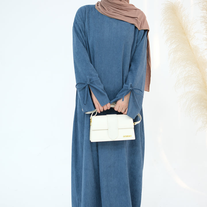 Get trendy with Tara Corduroy Abaya Dress - Teal - Dresses available at Voilee NY. Grab yours for $62.90 today!