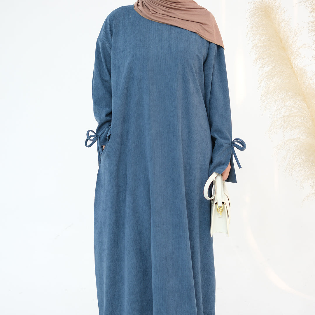 Get trendy with Tara Corduroy Abaya Dress - Teal - Dresses available at Voilee NY. Grab yours for $62.90 today!