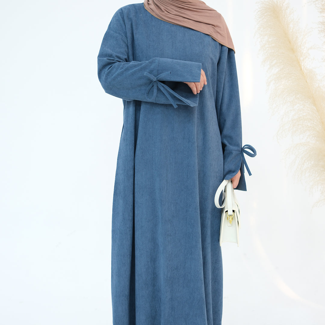 Get trendy with Tara Corduroy Abaya Dress - Teal - Dresses available at Voilee NY. Grab yours for $62.90 today!