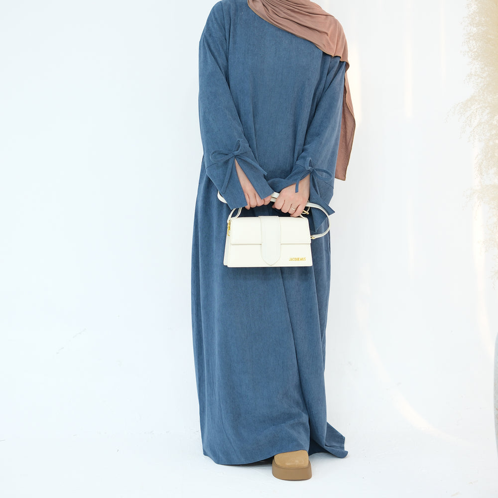 Get trendy with Tara Corduroy Abaya Dress - Teal - Dresses available at Voilee NY. Grab yours for $62.90 today!