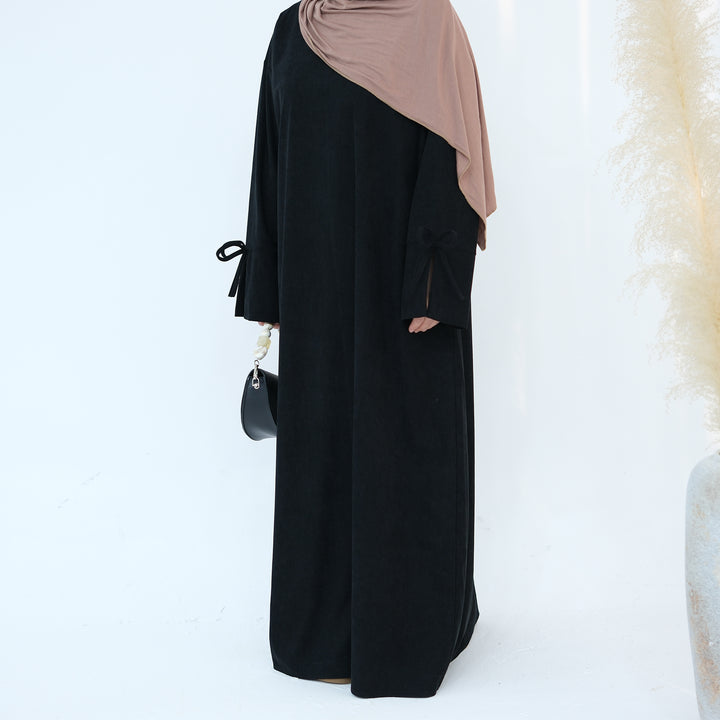 Get trendy with Tara Corduroy Abaya Dress - Black - Dresses available at Voilee NY. Grab yours for $62.90 today!