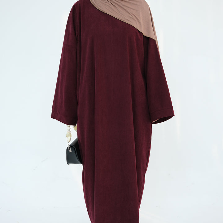 Get trendy with Annan Corduroy Abaya Dress - Wine - Dresses available at Voilee NY. Grab yours for $62.90 today!