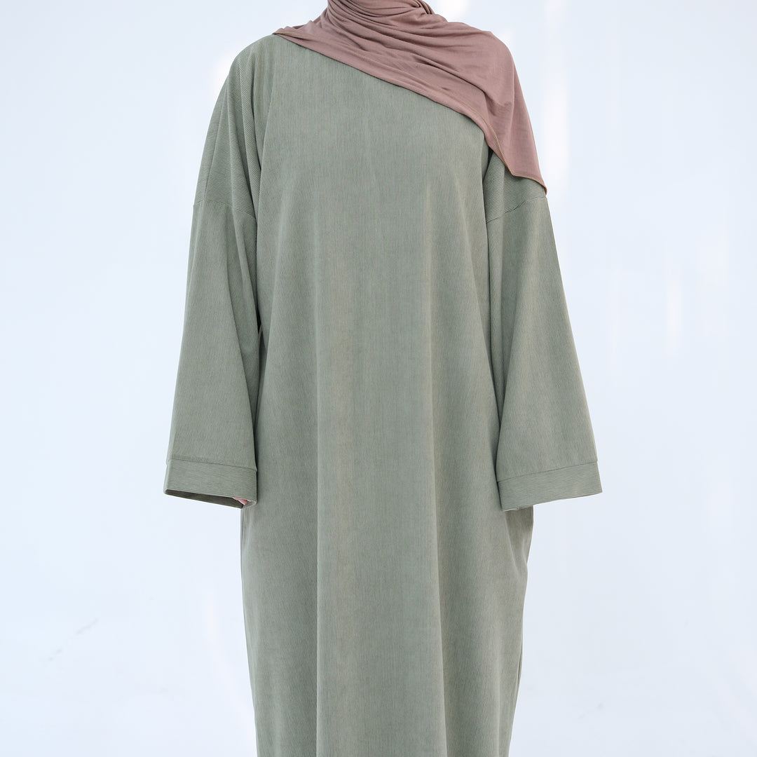 Get trendy with Annan Corduroy Abaya Dress - Sage - Dresses available at Voilee NY. Grab yours for $62.90 today!