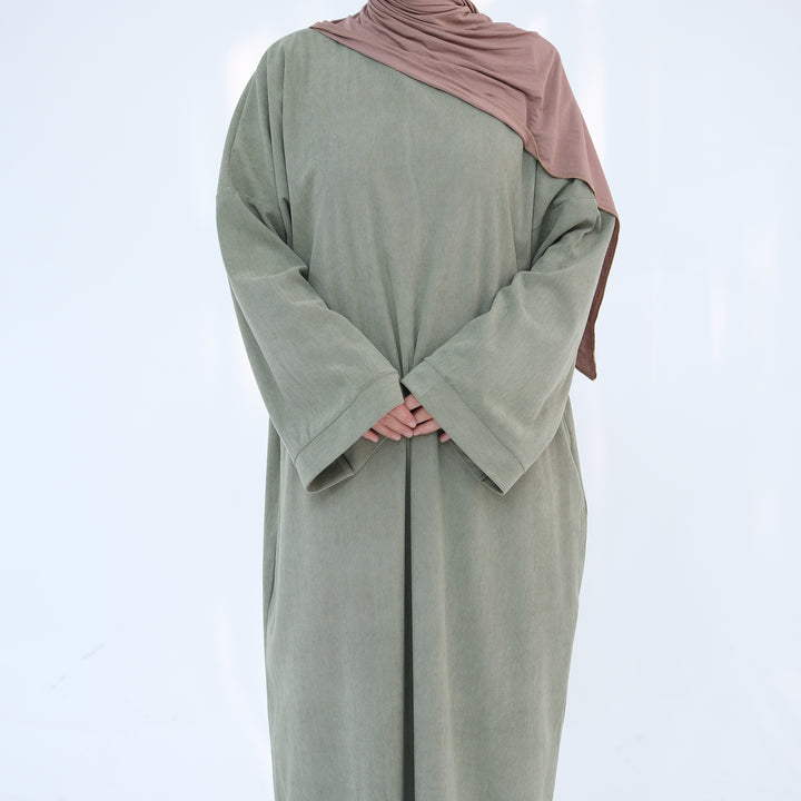 Get trendy with Annan Corduroy Abaya Dress - Sage - Dresses available at Voilee NY. Grab yours for $62.90 today!