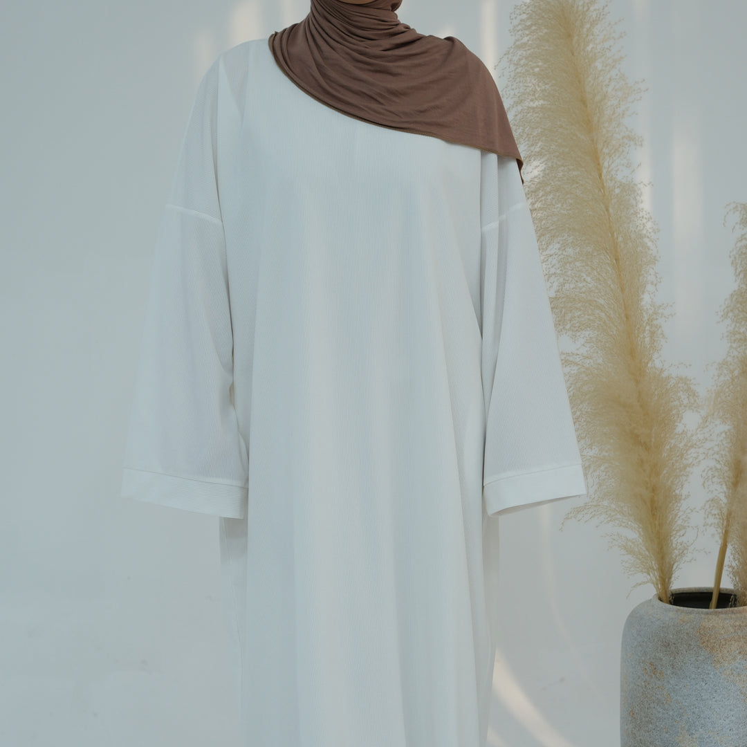 Get trendy with Annan Corduroy Abaya Dress - White - Dresses available at Voilee NY. Grab yours for $62.90 today!