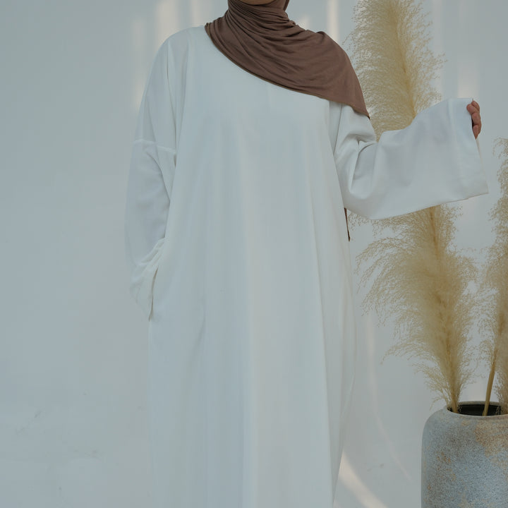 Get trendy with Annan Corduroy Abaya Dress - White - Dresses available at Voilee NY. Grab yours for $62.90 today!