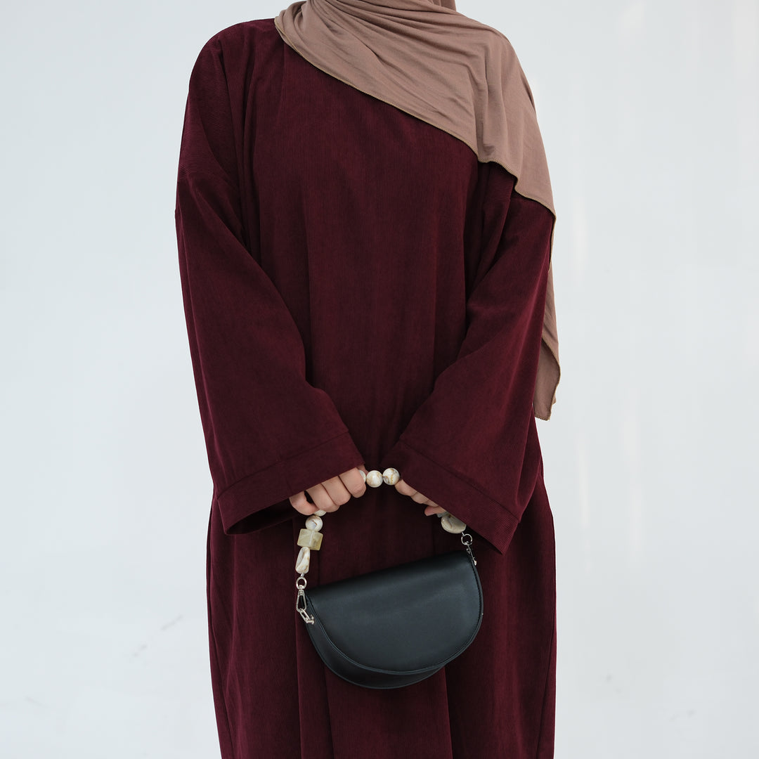 Get trendy with Annan Corduroy Abaya Dress - Wine - Dresses available at Voilee NY. Grab yours for $62.90 today!