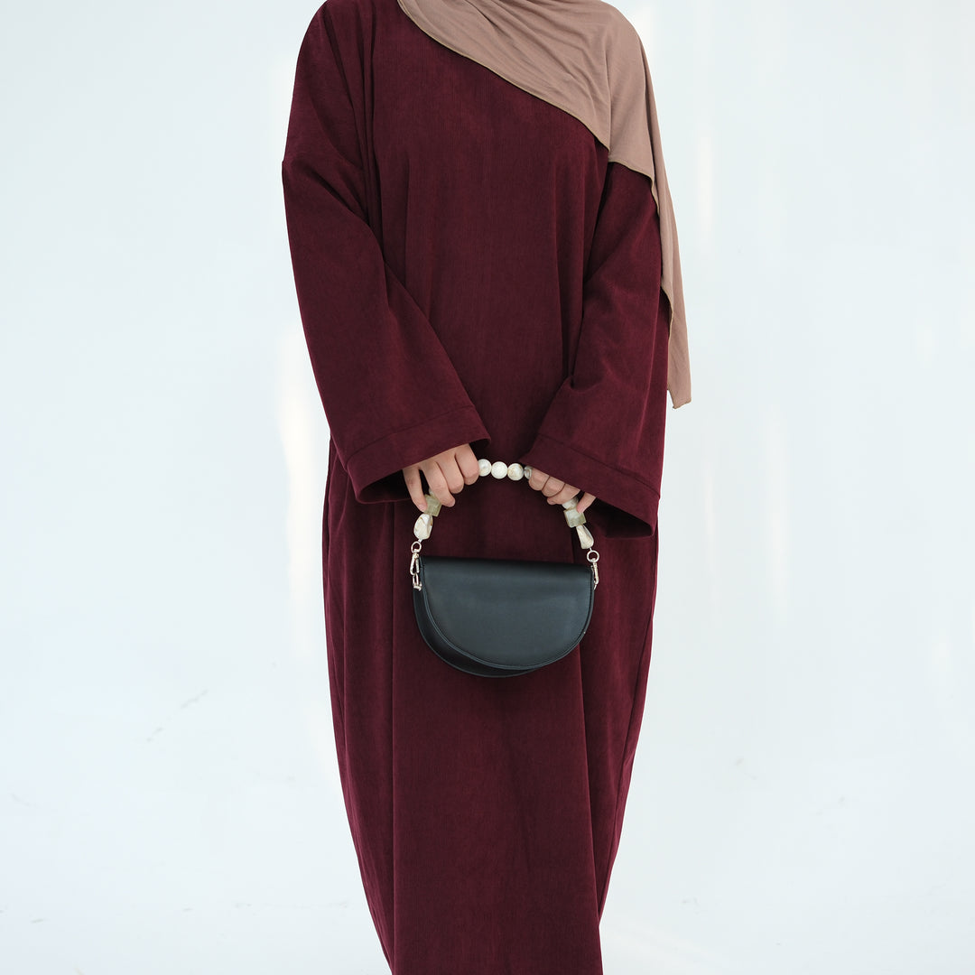 Get trendy with Annan Corduroy Abaya Dress - Wine - Dresses available at Voilee NY. Grab yours for $62.90 today!