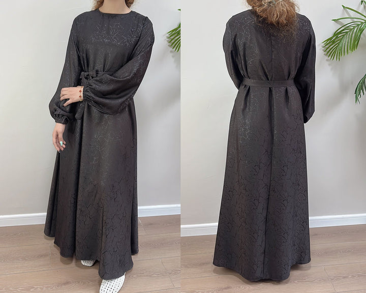 Get trendy with Maura Textured Abaya with Belt - Dresses available at Voilee NY. Grab yours for $59.90 today!