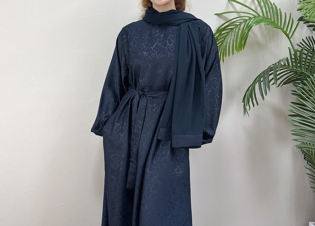 Get trendy with Maura Textured Abaya with Belt - Dresses available at Voilee NY. Grab yours for $59.90 today!