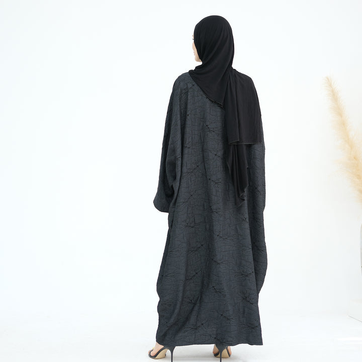 Get trendy with Nixie Textured Reversible Kimono Abaya - Gray Black - Cardigan available at Voilee NY. Grab yours for $74.90 today!