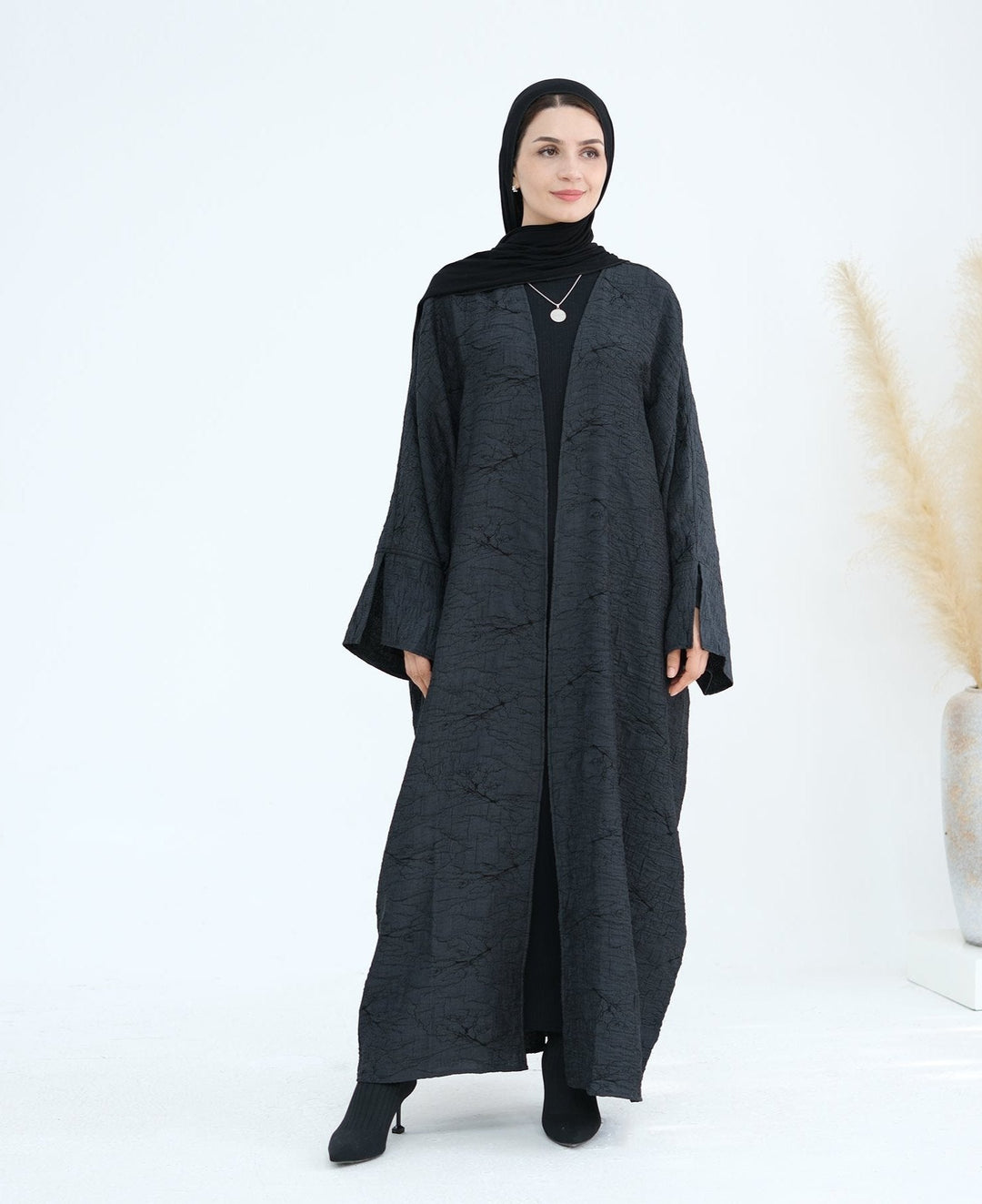 Get trendy with Nixie Textured Reversible Kimono Abaya - Gray Black - Cardigan available at Voilee NY. Grab yours for $74.90 today!