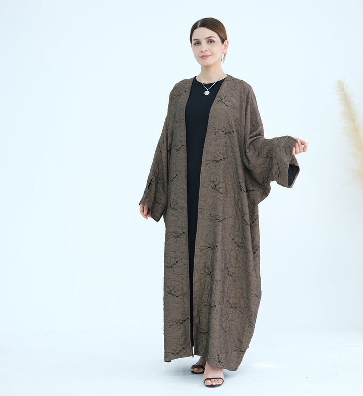 Get trendy with Nixie Textured Reversible Kimono Abaya - Brown Black - Cardigan available at Voilee NY. Grab yours for $74.90 today!