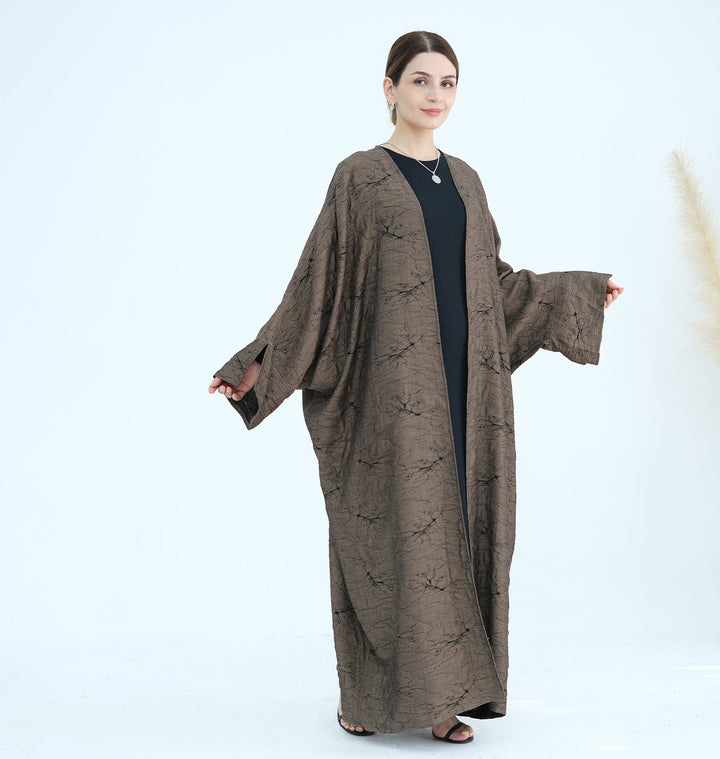 Get trendy with Nixie Textured Reversible Kimono Abaya - Brown Black - Cardigan available at Voilee NY. Grab yours for $74.90 today!