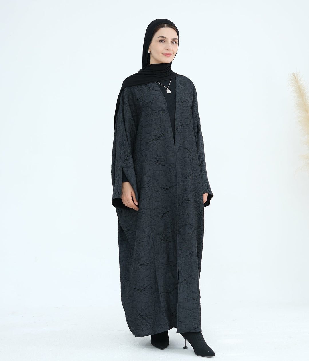 Get trendy with Nixie Textured Reversible Kimono Abaya - Gray Black - Cardigan available at Voilee NY. Grab yours for $74.90 today!