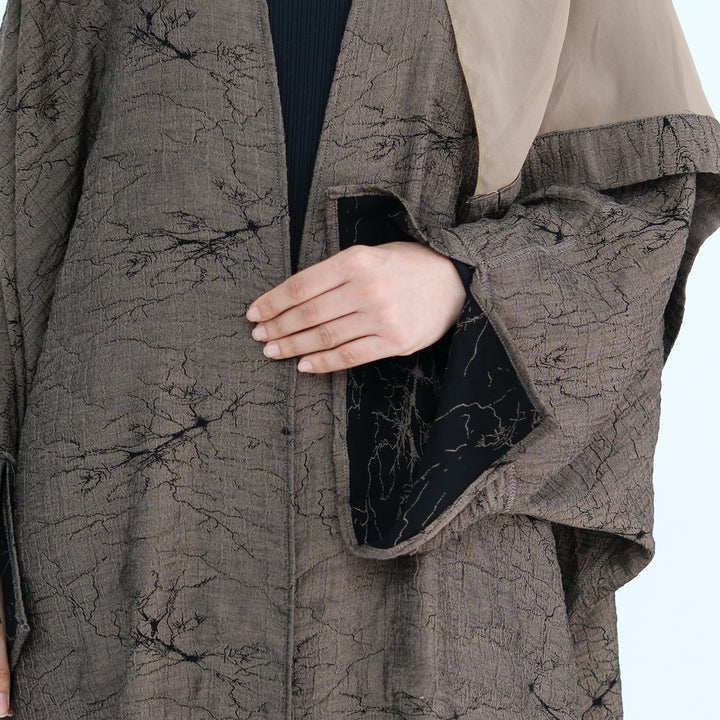 Get trendy with Nixie Textured Reversible Kimono Abaya - Brown Black - Cardigan available at Voilee NY. Grab yours for $74.90 today!