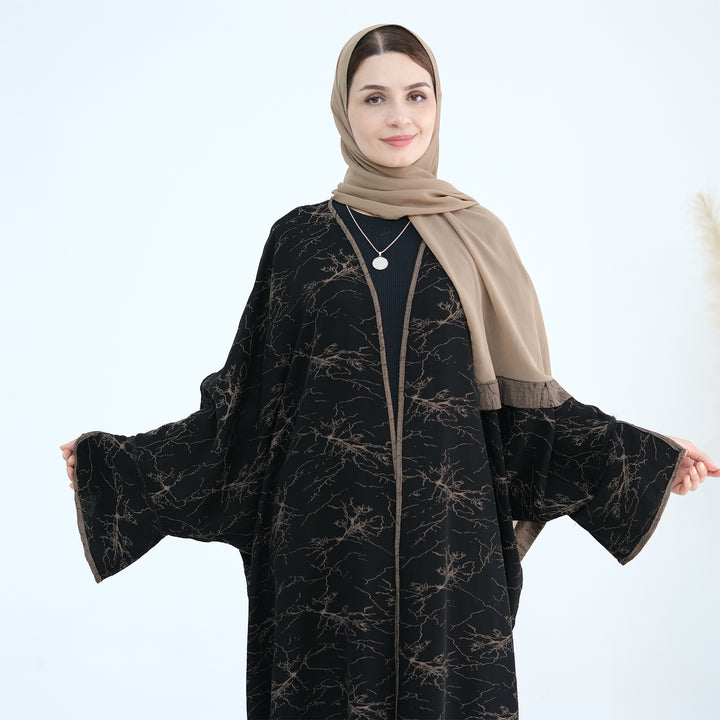 Get trendy with Nixie Textured Reversible Kimono Abaya - Brown Black - Cardigan available at Voilee NY. Grab yours for $74.90 today!