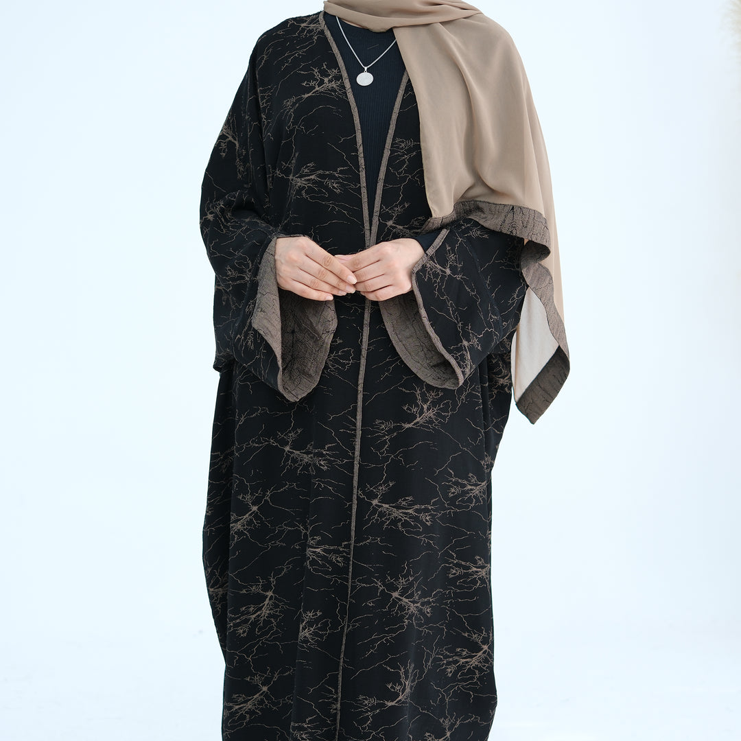 Get trendy with Nixie Textured Reversible Kimono Abaya - Brown Black - Cardigan available at Voilee NY. Grab yours for $74.90 today!